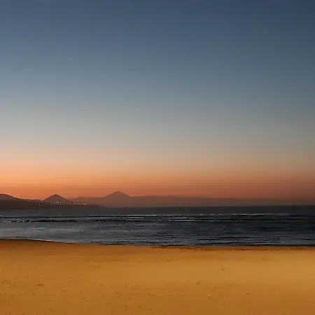By Playa De Canteras *
